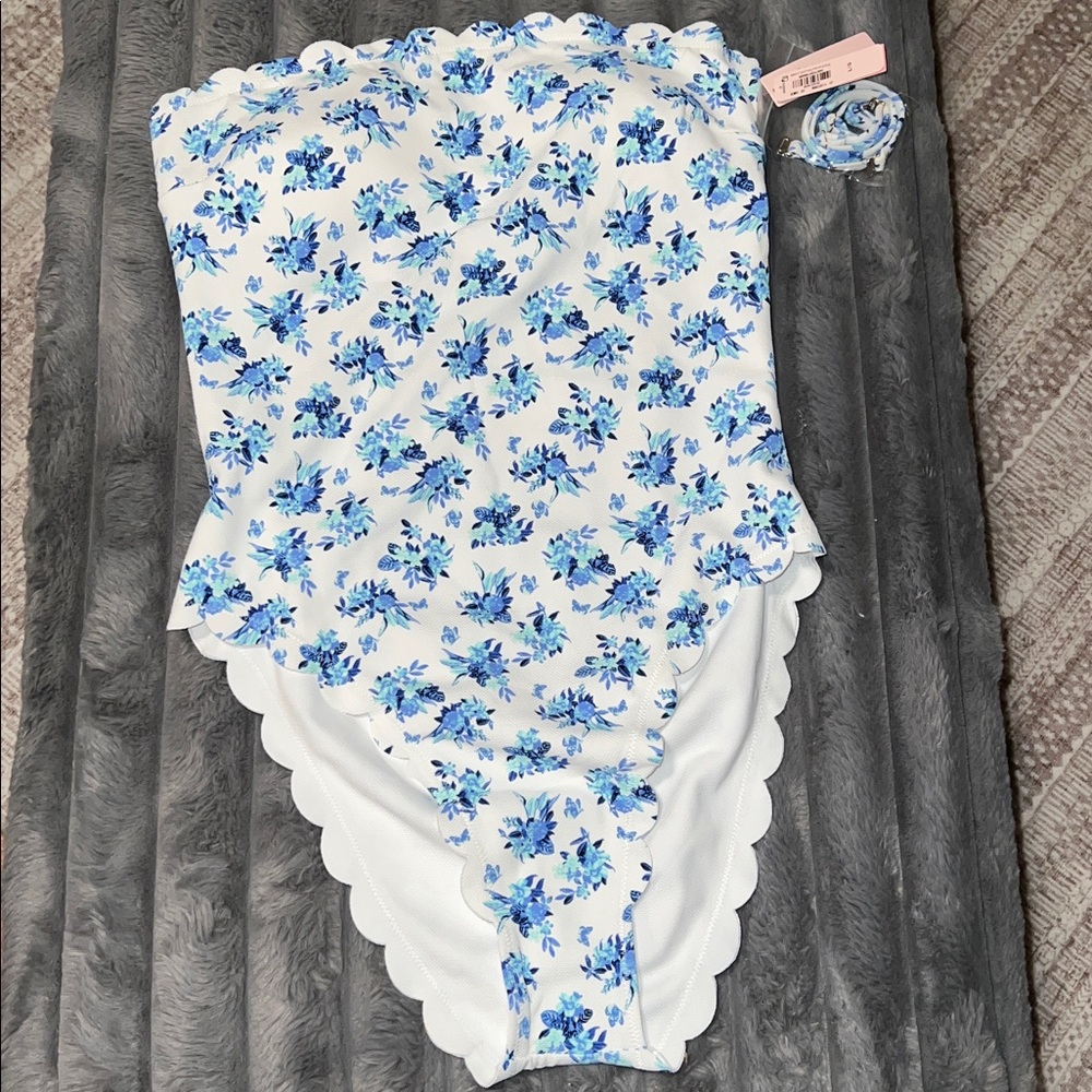 Victoria’s Secret Swim Floral One-Piece Swimsuit with scalloped hem.